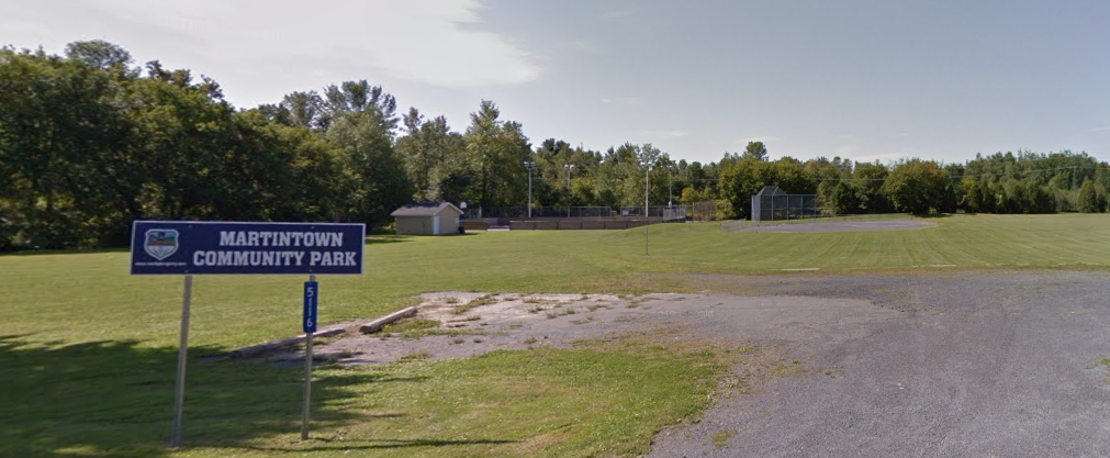 Image Depicts a landscape view of the Martintown Community Park with Baseball Diamond view in the background
