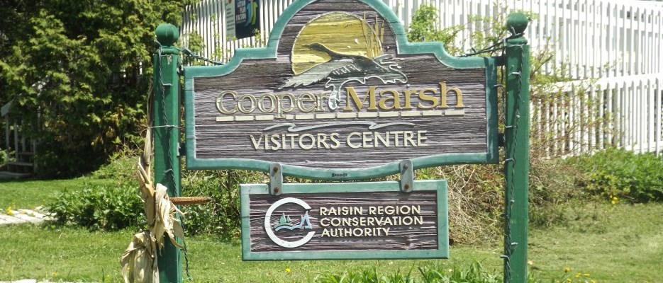 sign that says Cooper Marsh Visitors Centre