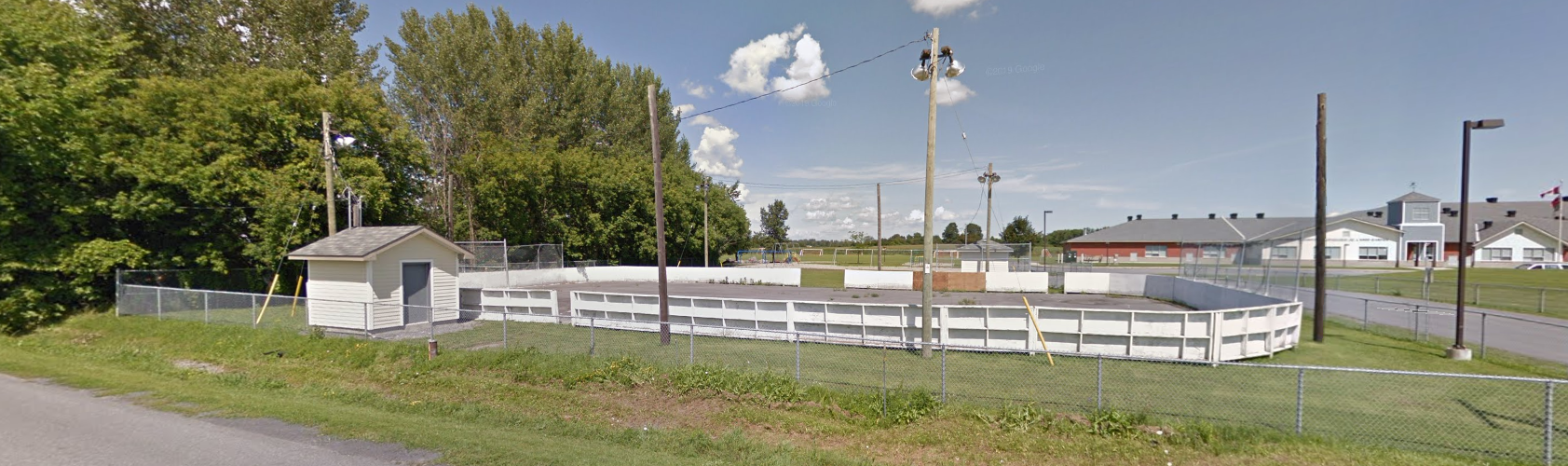 Image Depicts North Lancaster Optimist Park with view of multi-purpose pad